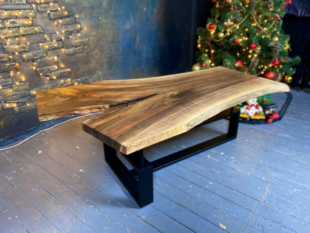 Coffee table made of natural walnut wood and epoxy resin