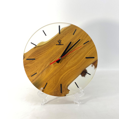 Wall clock "Annetti" in natural wood Acacia with epoxy resin 