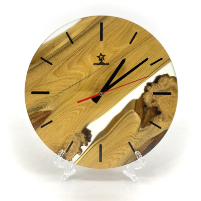 Wall clock "Fianite" in natural wood Acacia with epoxy resin 