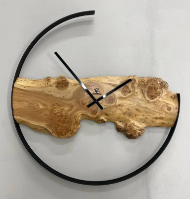 Wall clock "Paw" made of natural Elm wood 