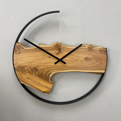 Wall clock made of natural Elm wood 