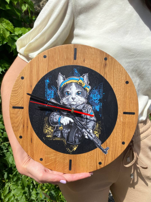 Wall clock "Protector cat" made of natural oak wood 